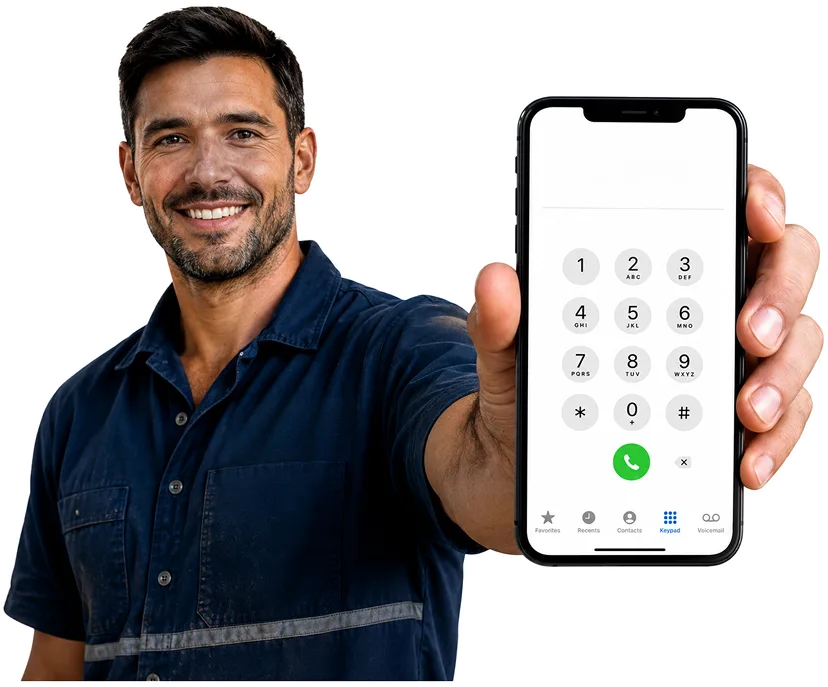 Plumber on the phone taking a Fairfield Heights callout